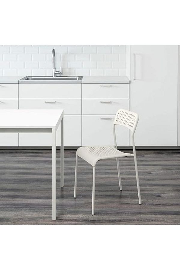 MAAS-Versatile modern dining chair with simple and unique design, perfect for all types of home decor. 1