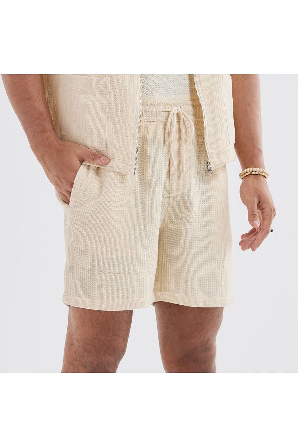 FAV-Textured Shorts With Drawstring Closure And Pockets 1