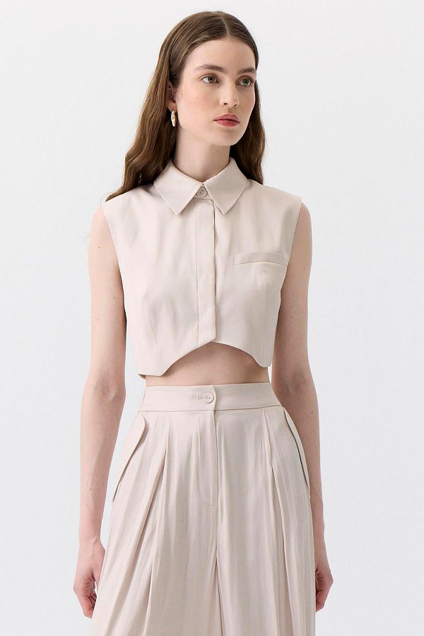 rue.-Asymmetric Cut Sleeveless Ecru Blouse 1