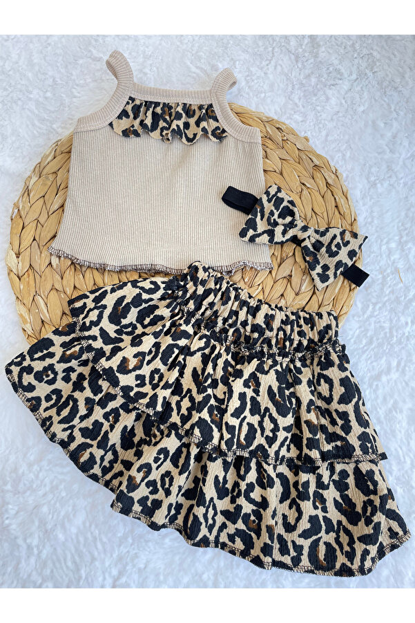 AKİF GİYİM KIZ ÇOCUK LEOPAR DESEN FIRFIRLI ETEK BLUZ BANDANA VE ÇORAP TAKIMI 4 LÜ SET