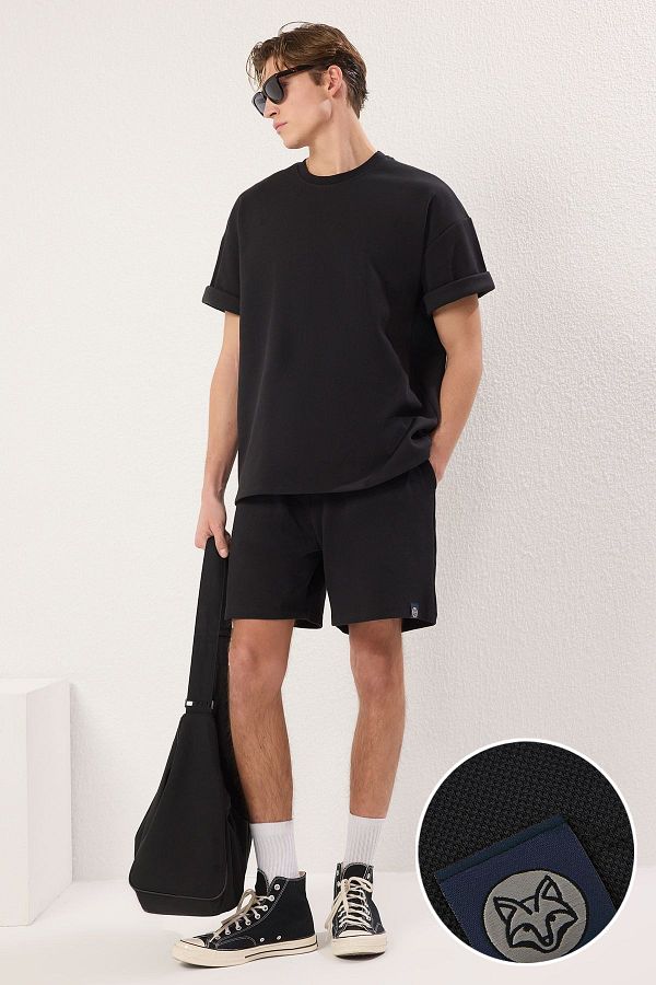 Trendyol Collection-Černá oversize bavlněná trička šortky Set TMNSS25EM00007 1
