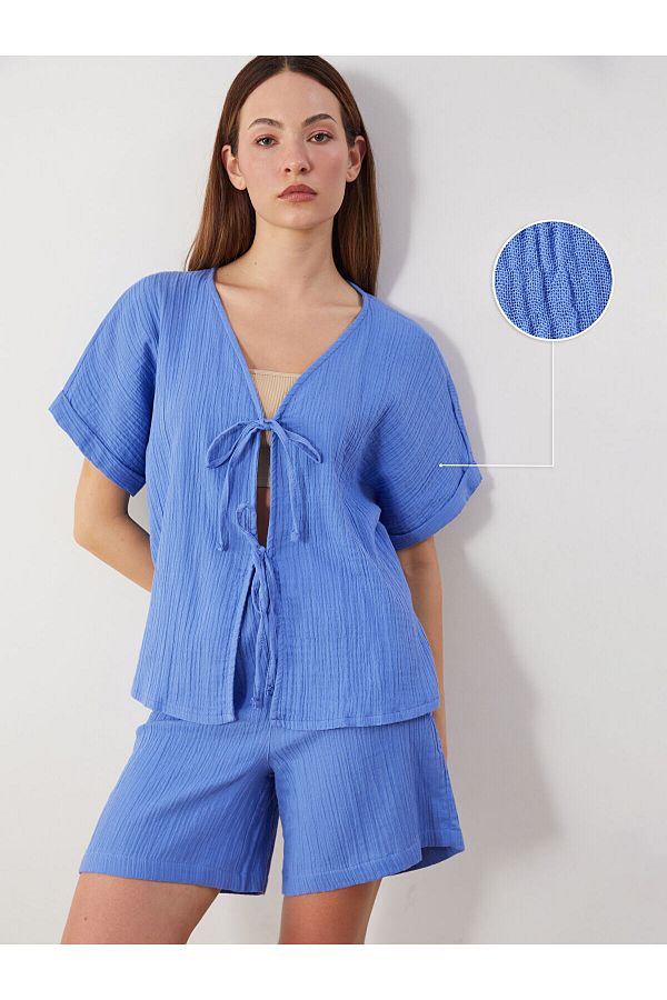 LC Waikiki-V-Neck Textured Muslin Blouse with Bow on the Front 1
