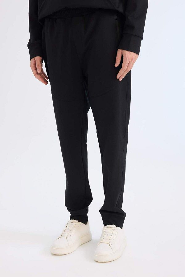 DeFacto-DeFactoFit Slim Fit Sportsman Jogger Jogginghose Slim Fit Standard Bein Basic Solid D8018AX25SP 1