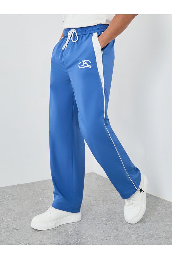 Styli-Woven Oversized Joggers with Side Piping and Adjustable Loop 1