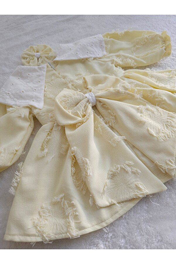 Elwirababyboutiqe limon sarısı püsküllü fisto yaka elbise