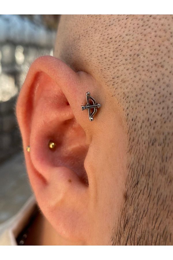 Cartilage arrow piercing new arrivals