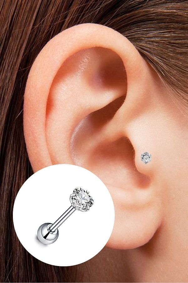 Tragus piercing with ball on back outlet