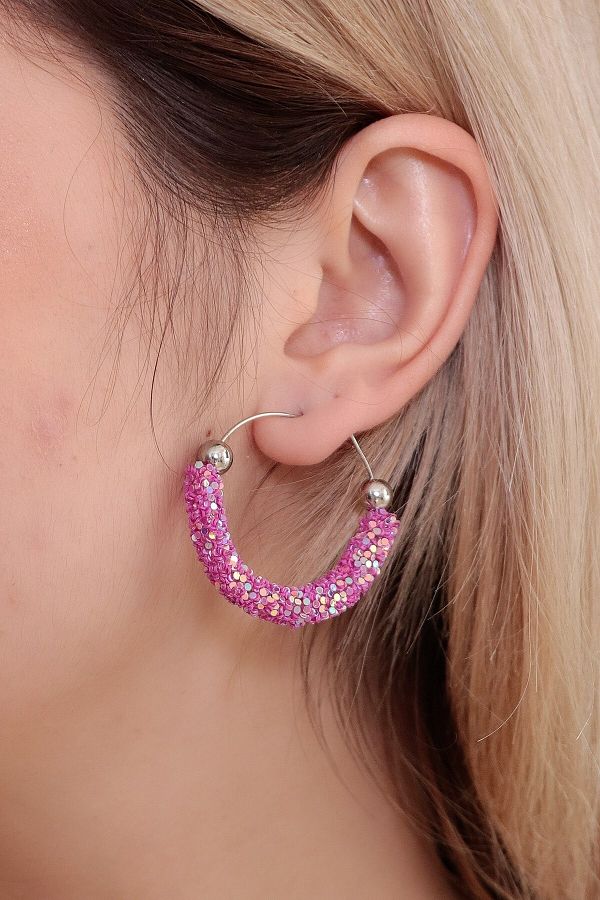 Pink glitter earrings top