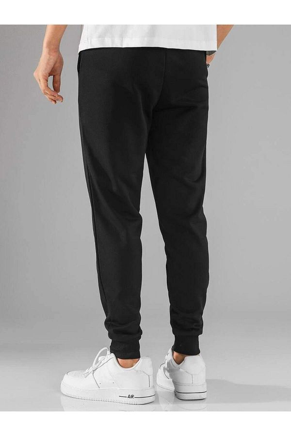 Black ribbed tracksuit on sale