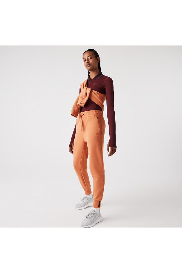 Orange lacoste joggers 2025