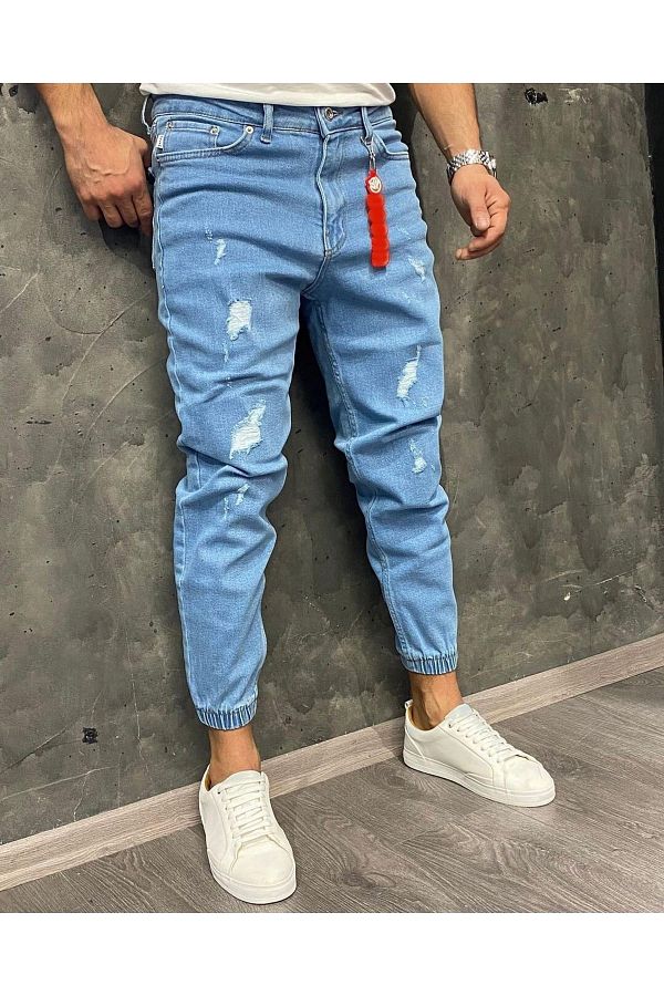 Oliggopol Men s Light Blue Ripped Cuff Elasticized Boyfriend Jogger Jeans Trendyol