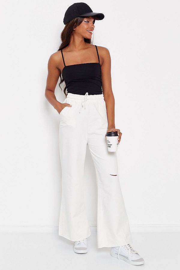 White ripped sweatpants on sale