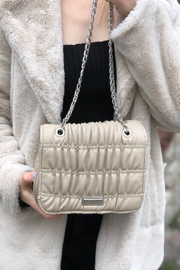 Cream chain bag top