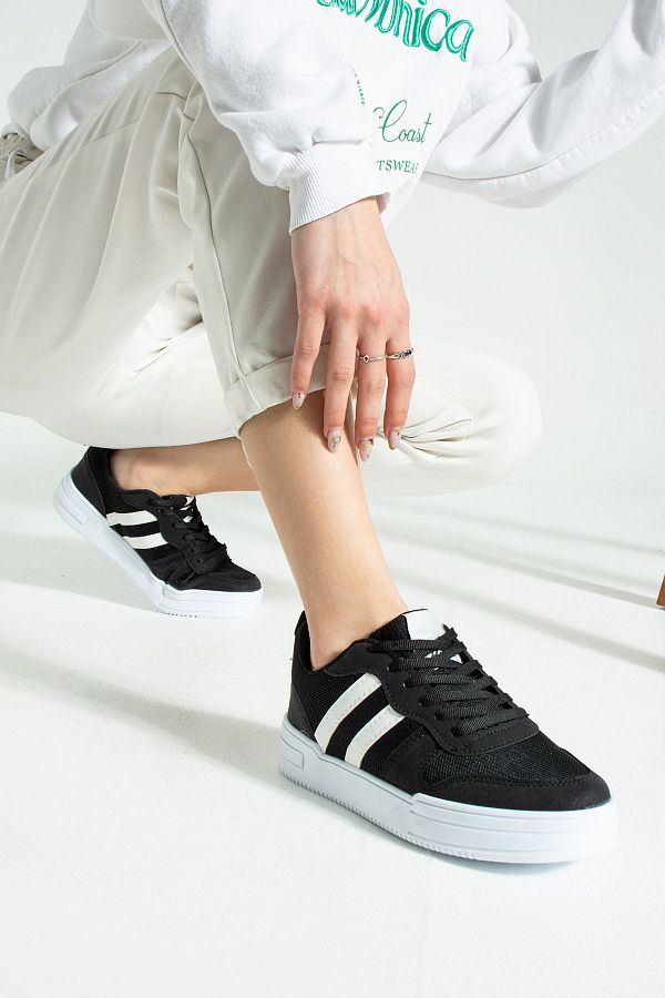 Black shoes with white stripe online