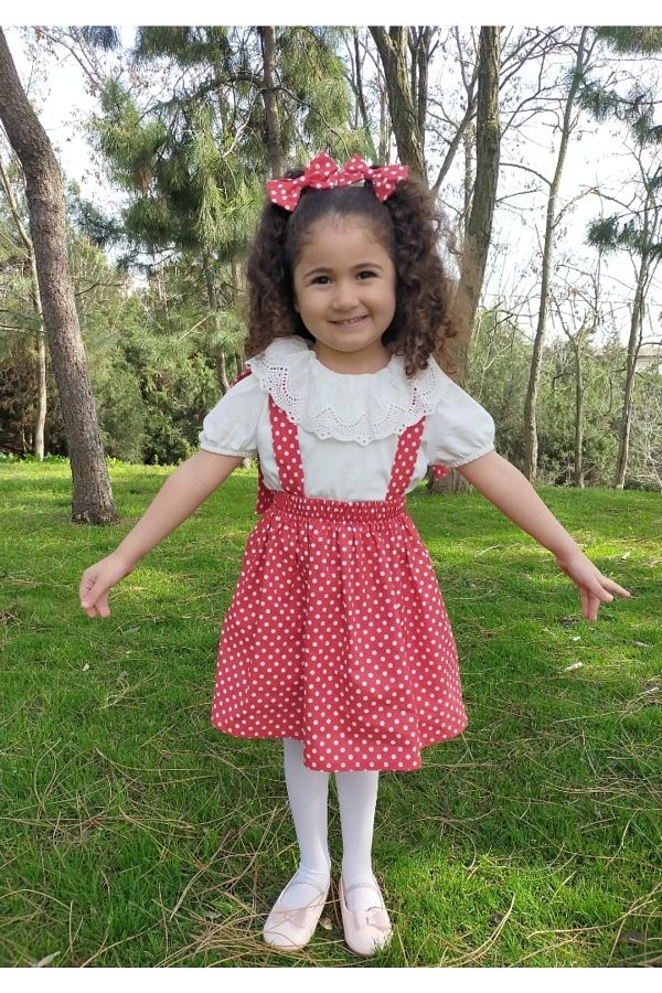 Red and white polka dot suspender skirt top