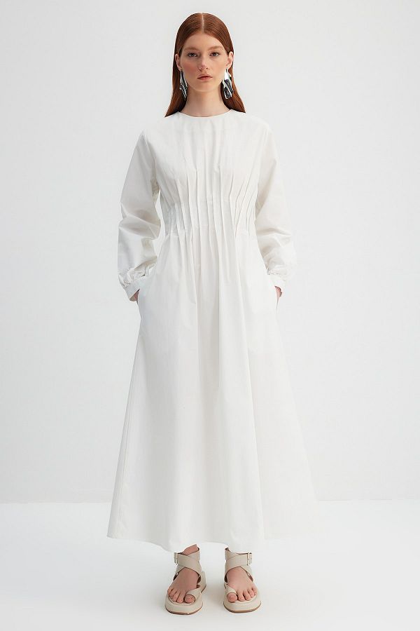 Trendyol Modest-Kevser Sarıoglu Puderfarbenes, geripptes Kleid mit Taschendetails aus 100 % Baumwollpopeline TCLSS23EB00005 1