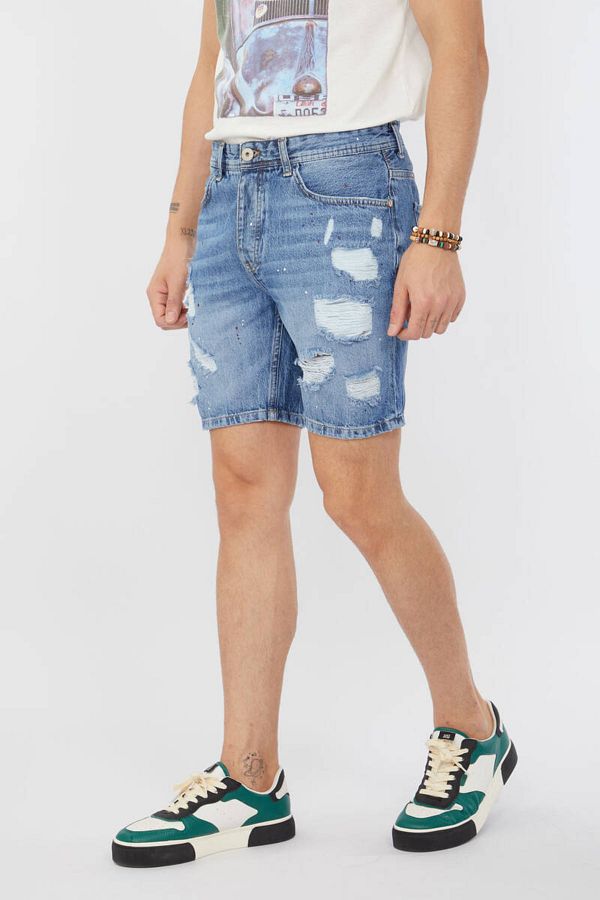 Ripped blue shorts new arrivals