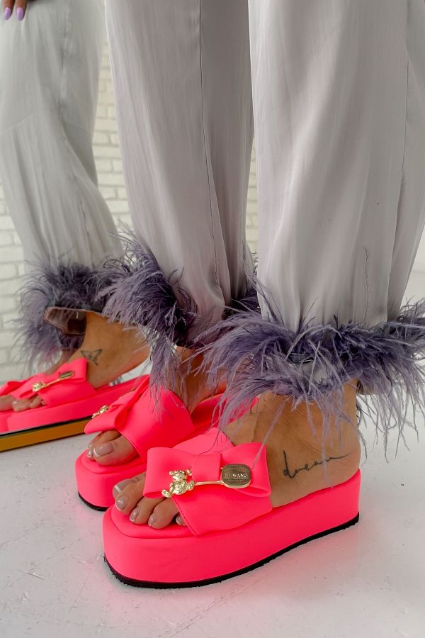 Neon pink slippers top