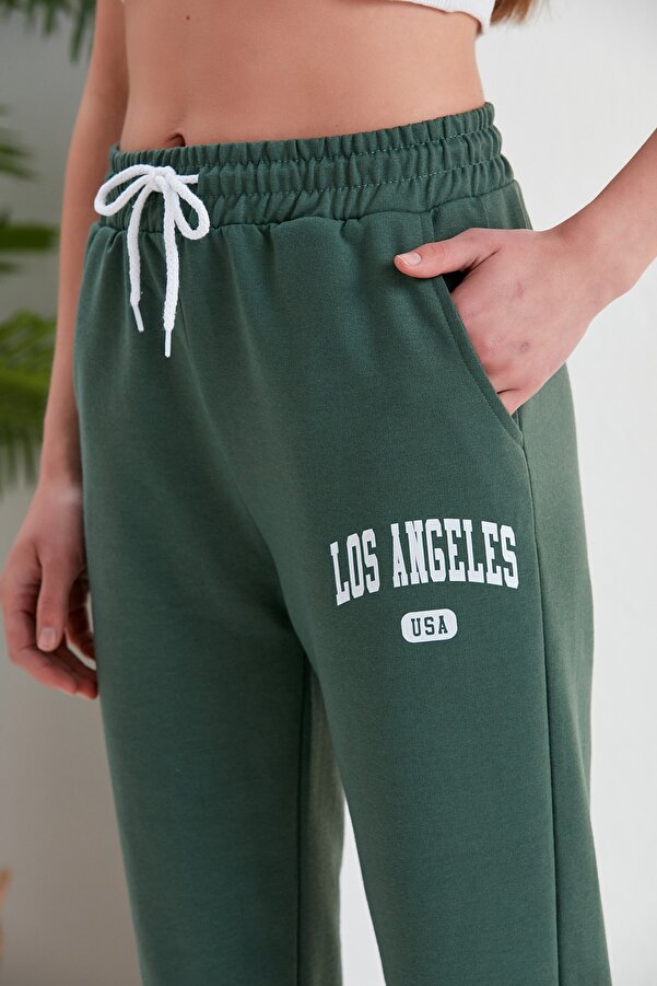 Green Hill Summer sweatpants with LOS ANGELES written on them