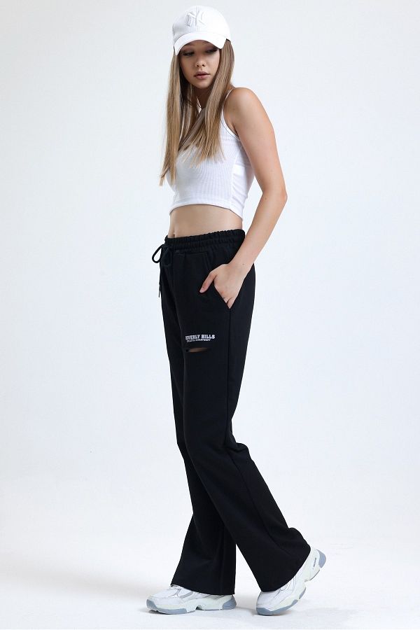 MD trend Women s Black Ripped Pocket Printed Elastic Waist Wide Leg Sweatpants Trendyol