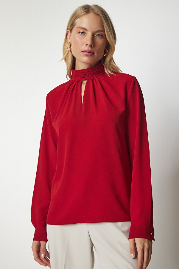 red flowy blouse