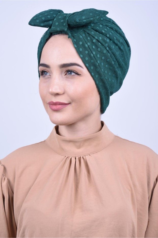 غطاء خارجي من الدانتيل باللون الأخضر الزمردي