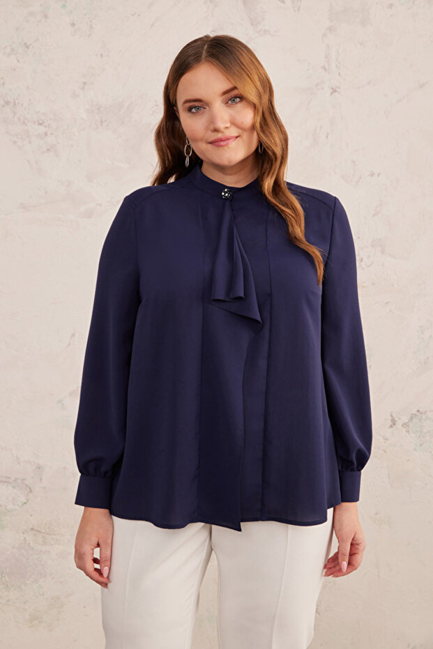 بلوزة بتفاصيل دولاب الموازنة - 4