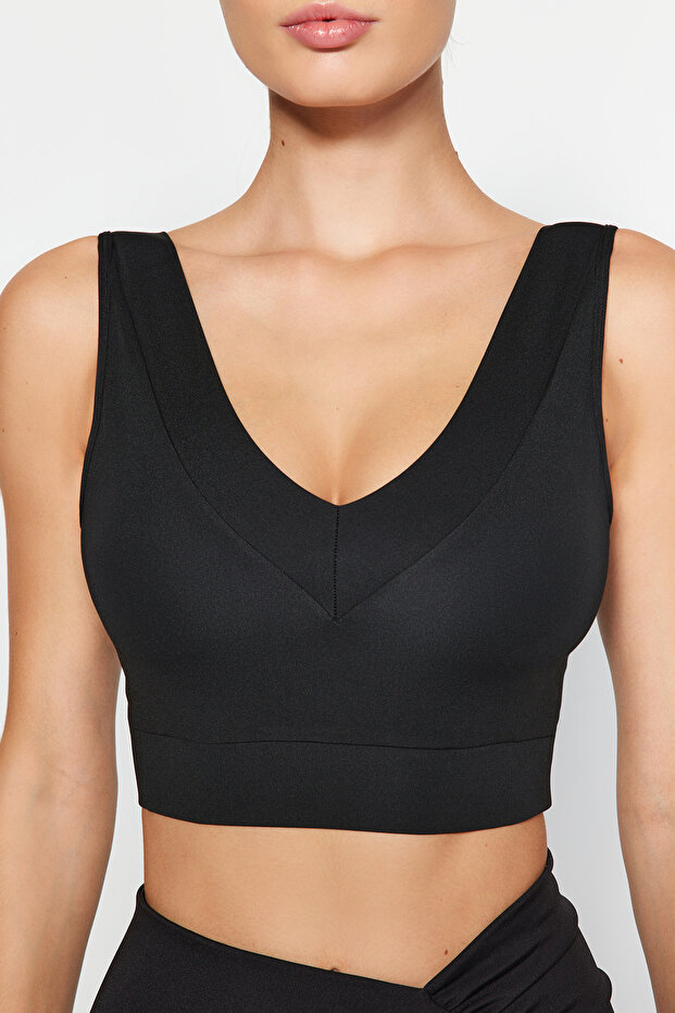 Czarny, podtrzymujący/modelujący biustonosz sportowy z dekoltem w serek i grubymi ramiączkami, dzianinowy THMAW24SS00017 - 4