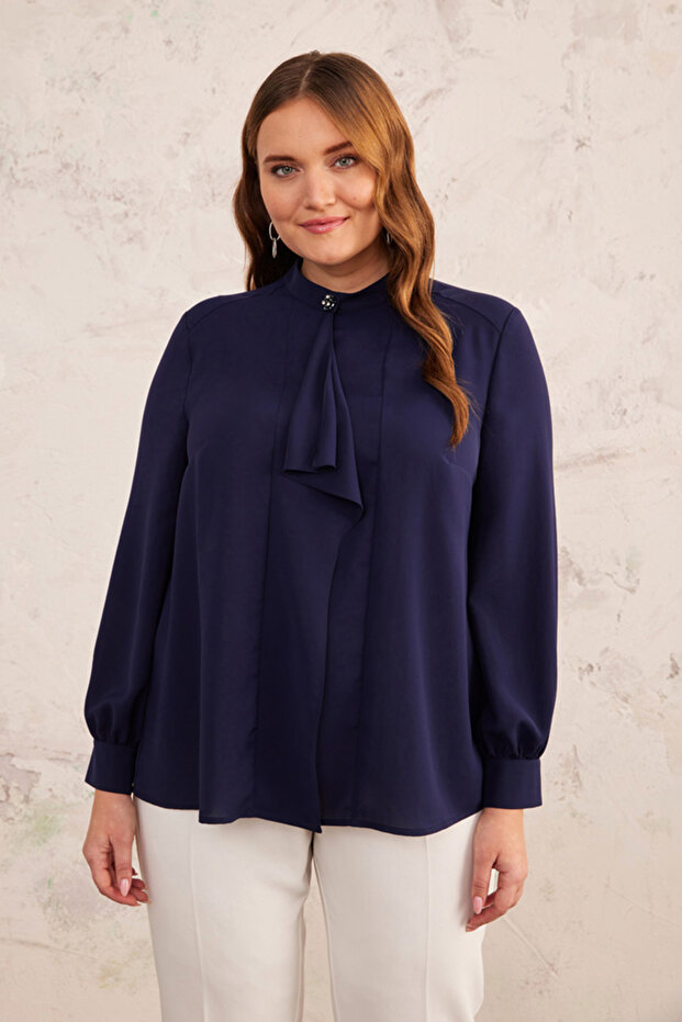 بلوزة بتفاصيل دولاب الموازنة - 2