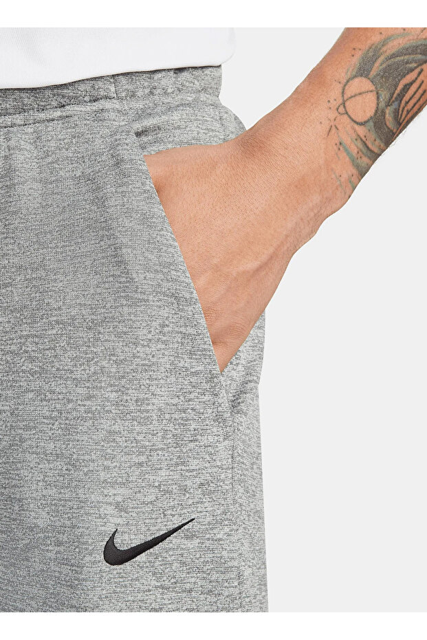 Standardní černo-šedo-stříbrné pánské tepláky DQ5405-063 M NK TF PANT TAPER - 1