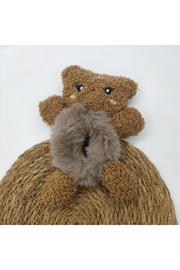 PLUSH TOBEL BUCKLE WITH BEAR FIGURE