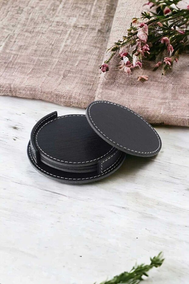 قاعدة أكواب مخيطة من الجلد الصناعي باللون الأسود 4 قطع (مع حامل)