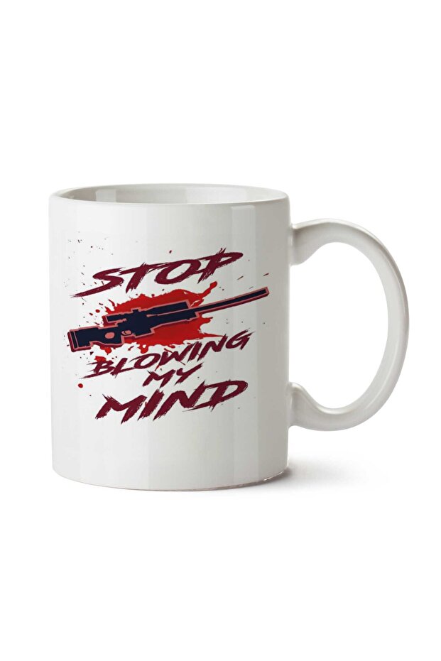 كوب مطبوع عليه عبارة "Stop Blowing My Mind" على الوجهين