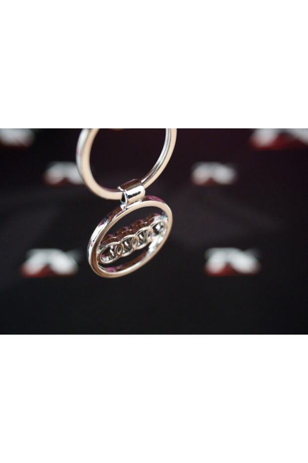 سلسلة مفاتيح معدنية مزدوجة الاتجاه بشعار Dk Tuning Ring