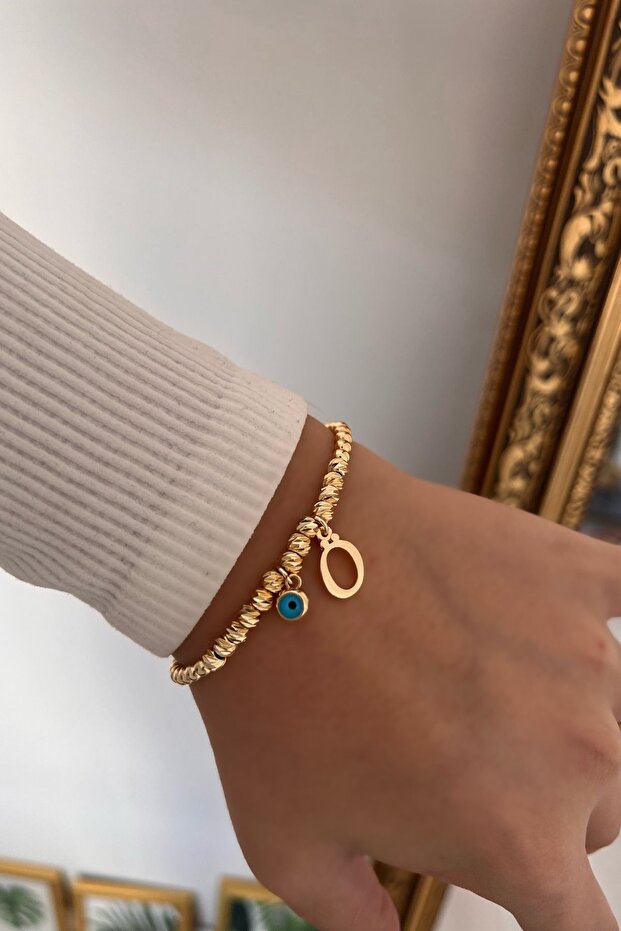 Dorica Bracelet with Letter Ö and Evil Eye Hanging