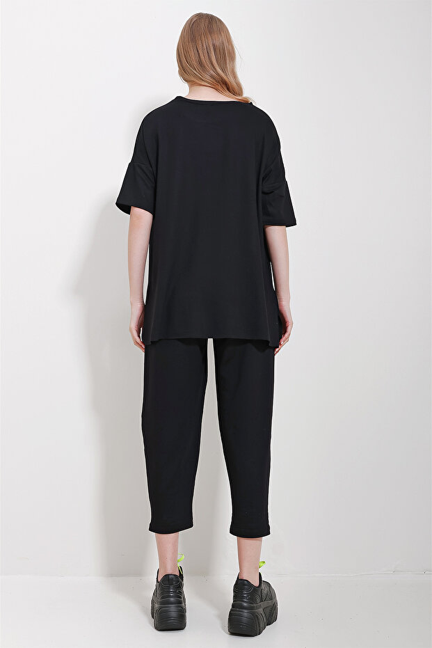 Schwarzes Set aus Bluse und Hose mit Rundhalsausschnitt, asymmetrischem Schnitt und Stickerei für Damen ALC-X11604 - 6