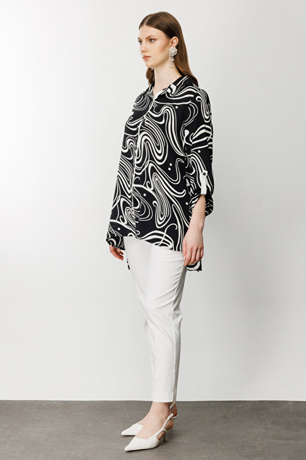 بلوزة منقوشة بأكمام كتاف - 2