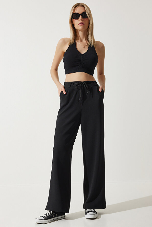 Damskie czarne spodnie dresowe z szeroką nogawką RV00193 - 3