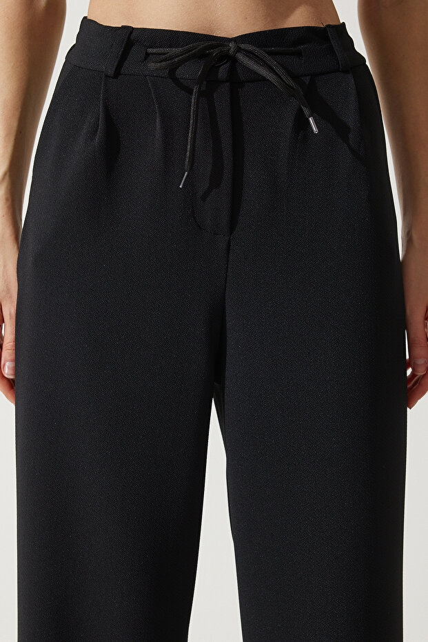 Damskie czarne spodnie dresowe z szeroką nogawką RV00193 - 5