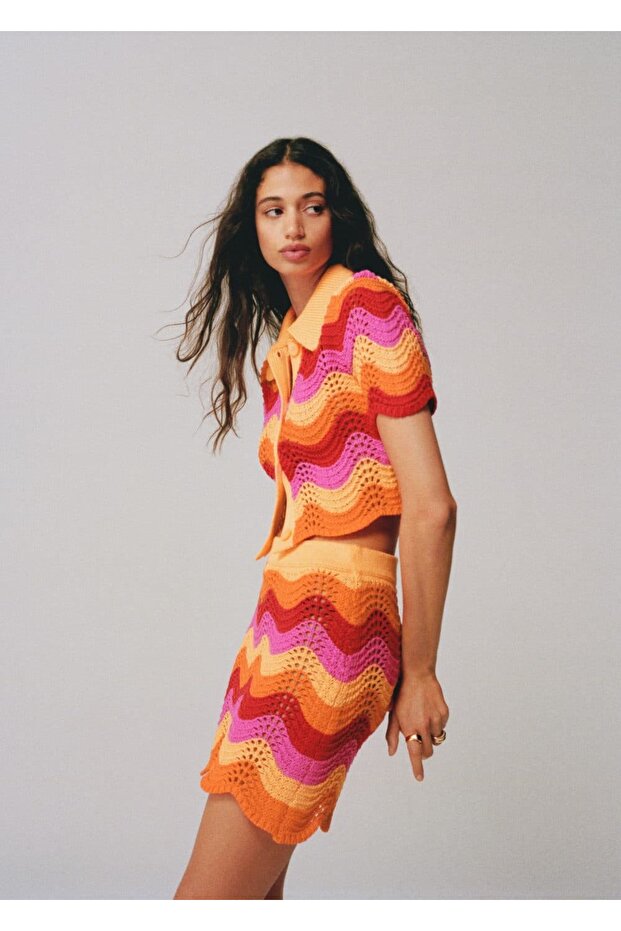 Delikli dokumalı mini etek - 7