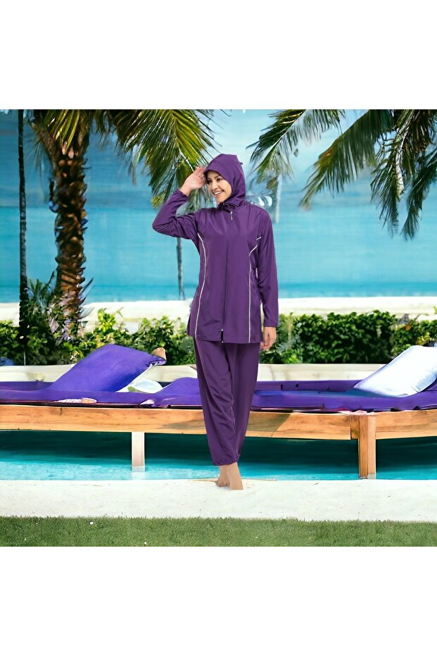 موديل طويل الأكمام بتصميم هندسي مع تطريز كامل للحجاب