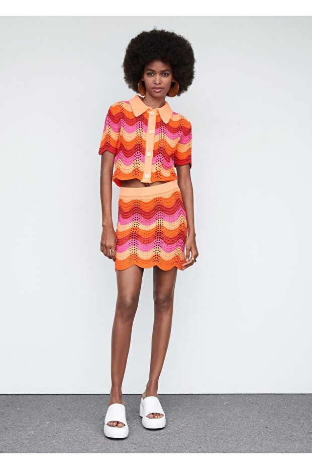 Delikli dokumalı mini etek - 2