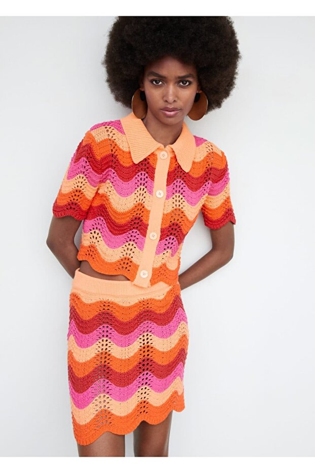 Delikli dokumalı mini etek - 1