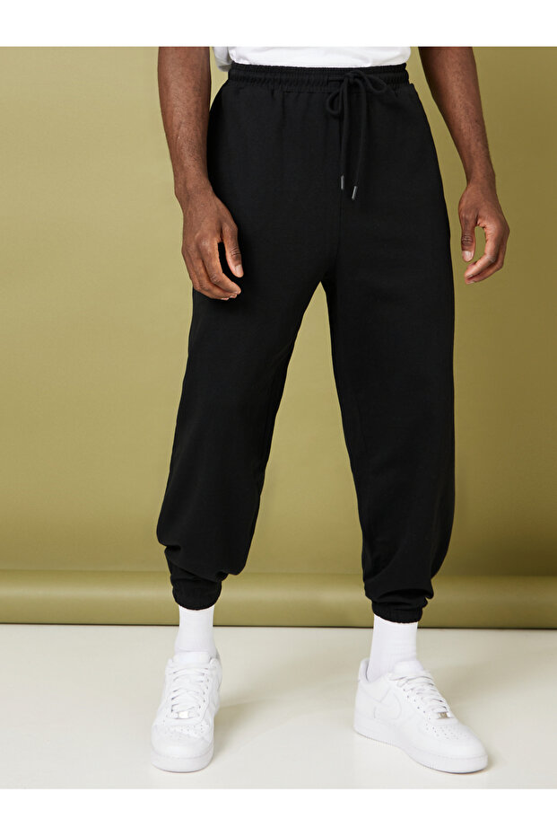 بنطال رياضي بأساور مطاطية مقاس كبير - 1