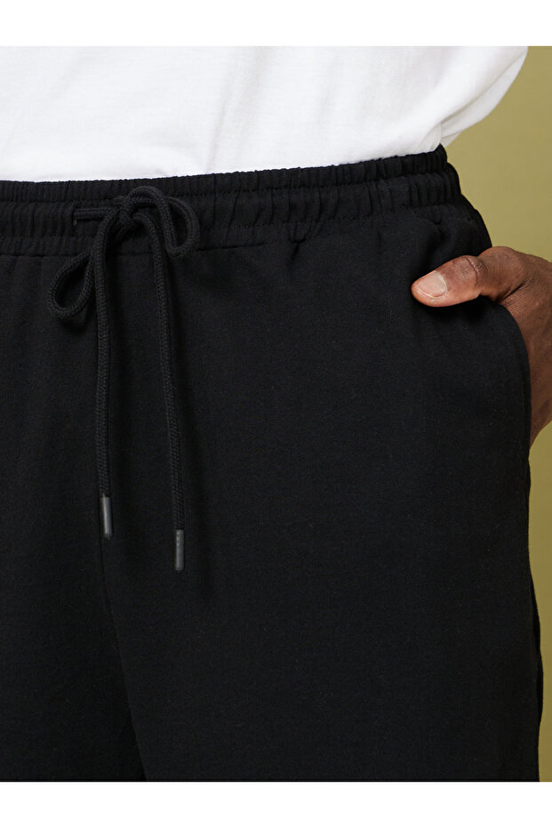 بنطال رياضي بأساور مطاطية مقاس كبير - 3