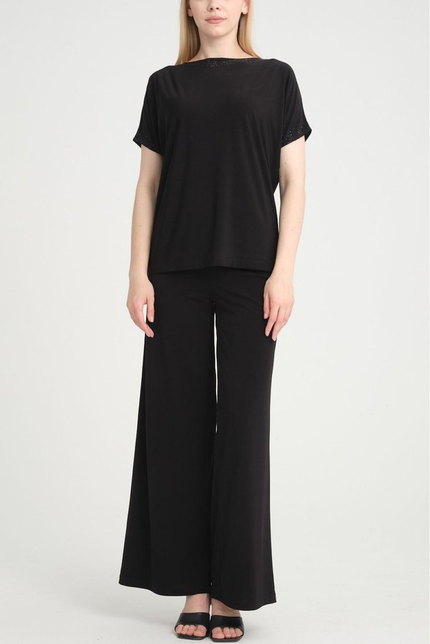 Lycra jersey blouse with crystal detailing on the collar and sleeves.