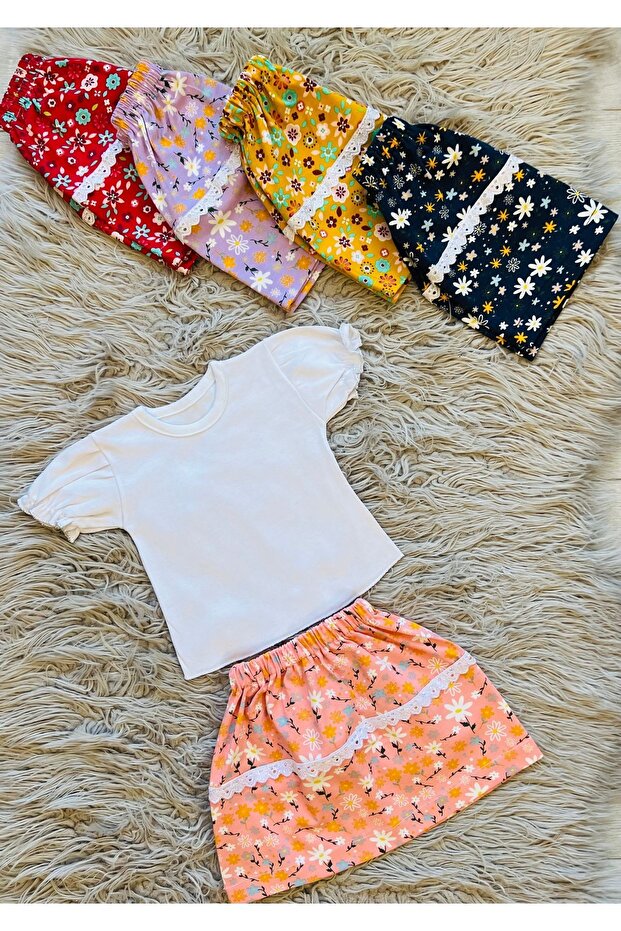 Crisp patterned ruffled skirt and white t-shirt, 2-piece set.