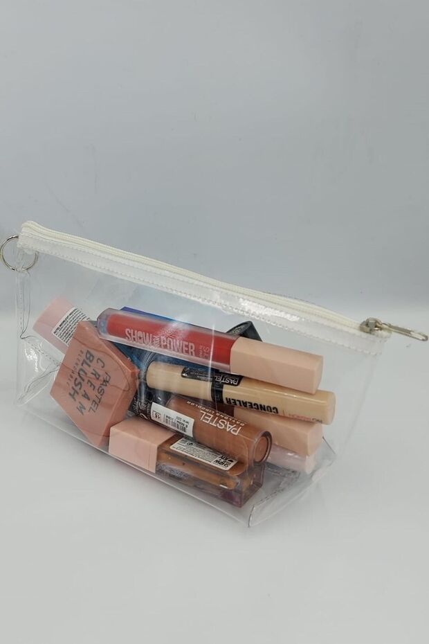 حقيبة مكياج مثلثة بيضاء وشفافة - 1