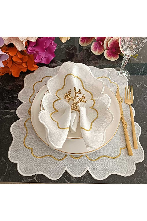 Two American-style placemats with off-white and gold details, made from stain-resistant fabric.