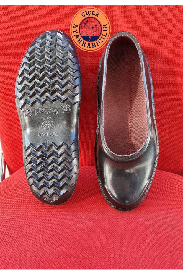 Arisan Lined Black Rubber Women